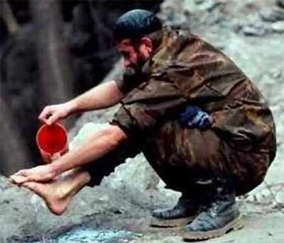 soldier cleaning feet soldier cleaning feet